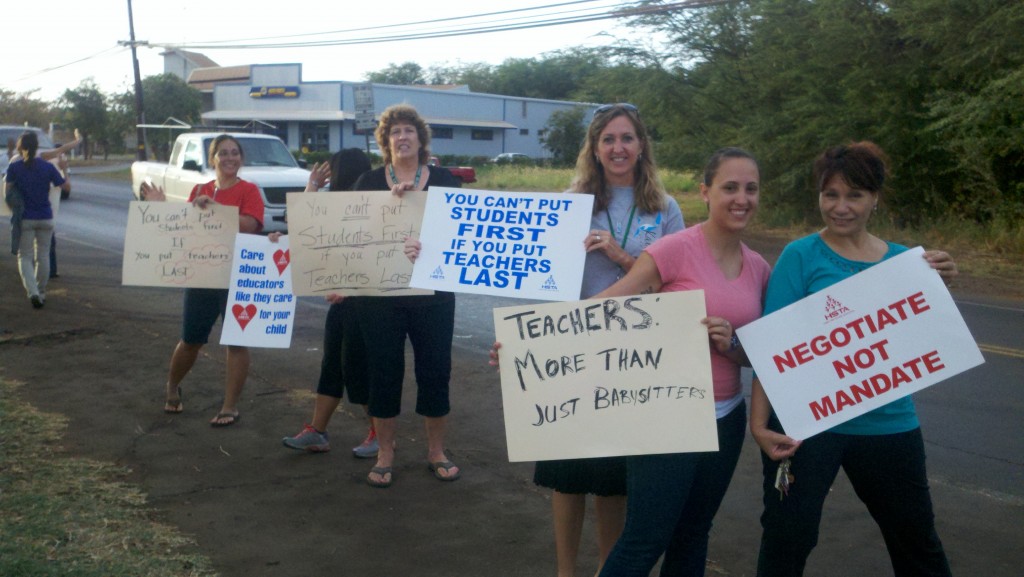 Teachers protest in front of Kaunakakai School last week. Photo by Jenn Whitted