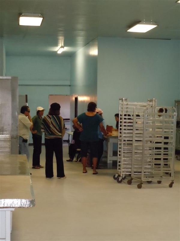 Community members gathered in support of the bakery during last week's DOH inspection. Photo by Catherine Cluett