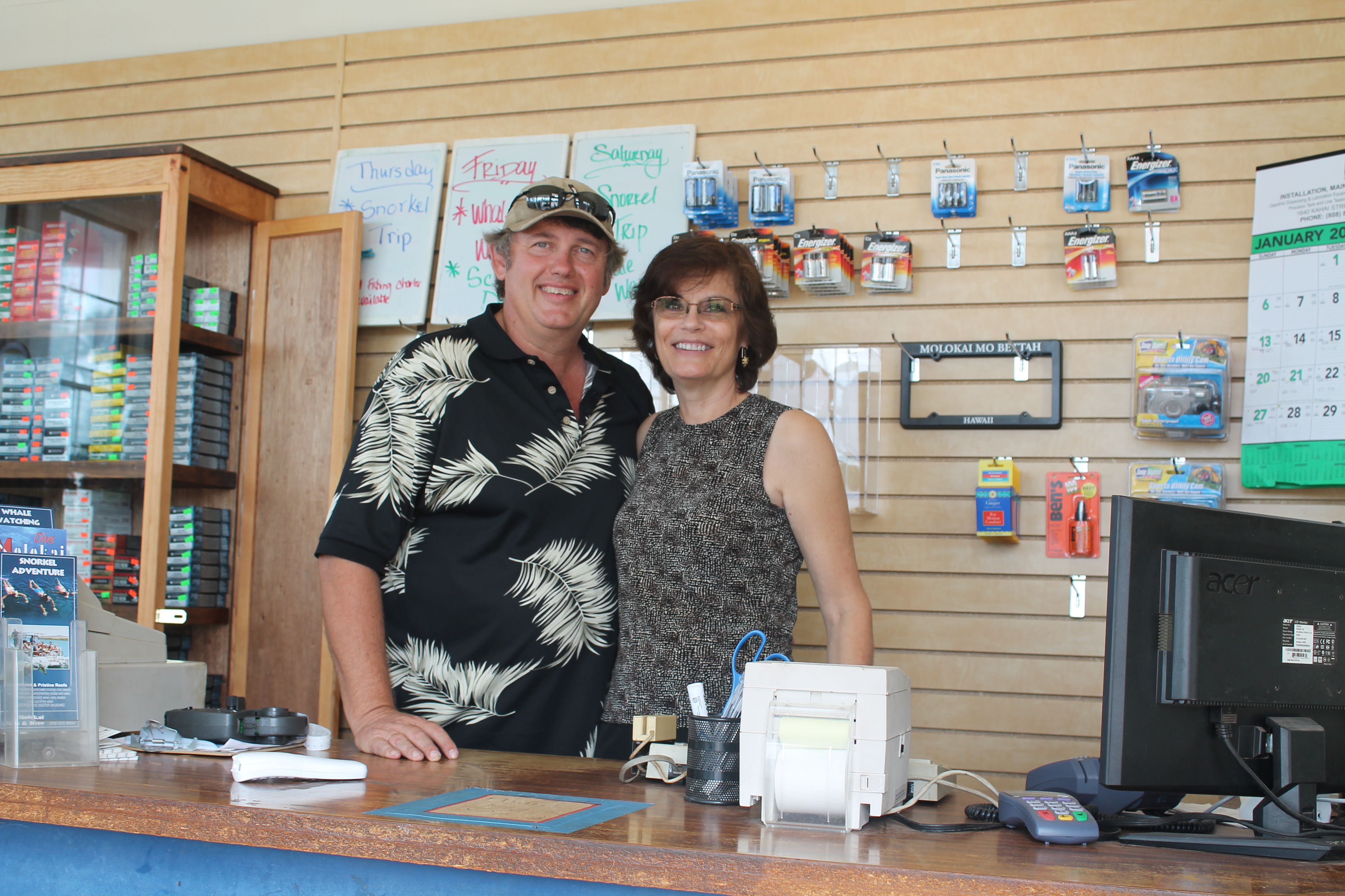 Tim and Susan Forsberg stand at the counter of the Fish and Dive's new location.