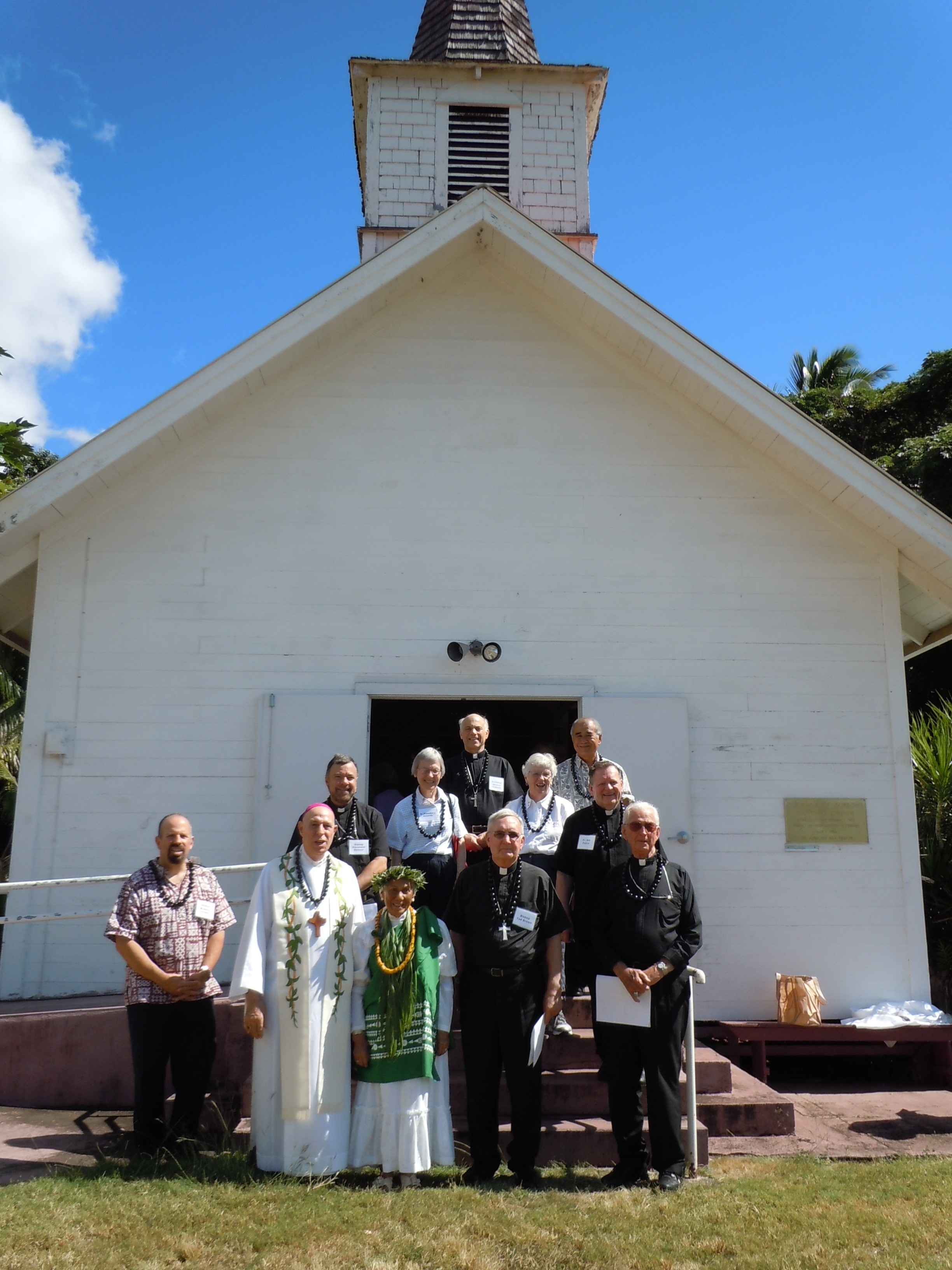 A group of dignitaries honoring St. Marianne's relic at Our Lady of Seven Sorrows. Photo by Catherine Cluett