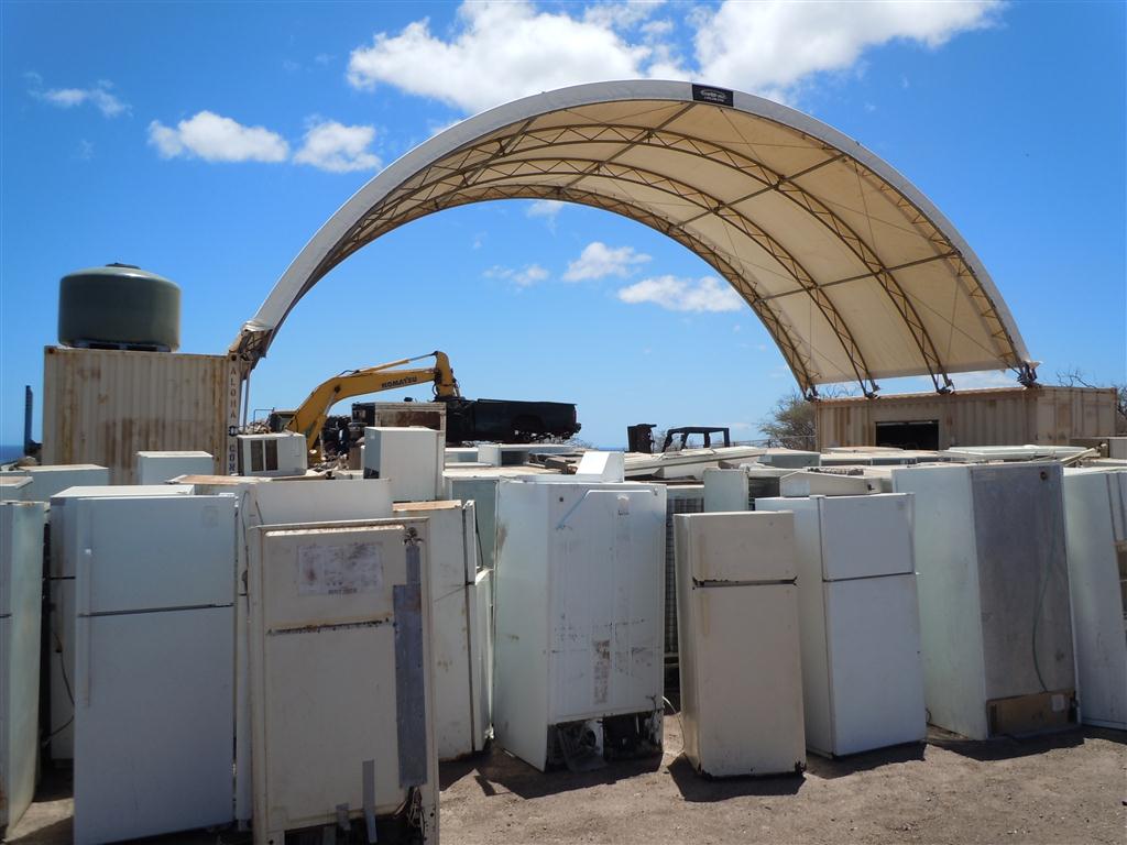 Fridges awaiting processing at the Molokai Metals Recycling Facility at the landfill. Photo by Catherine Cluett